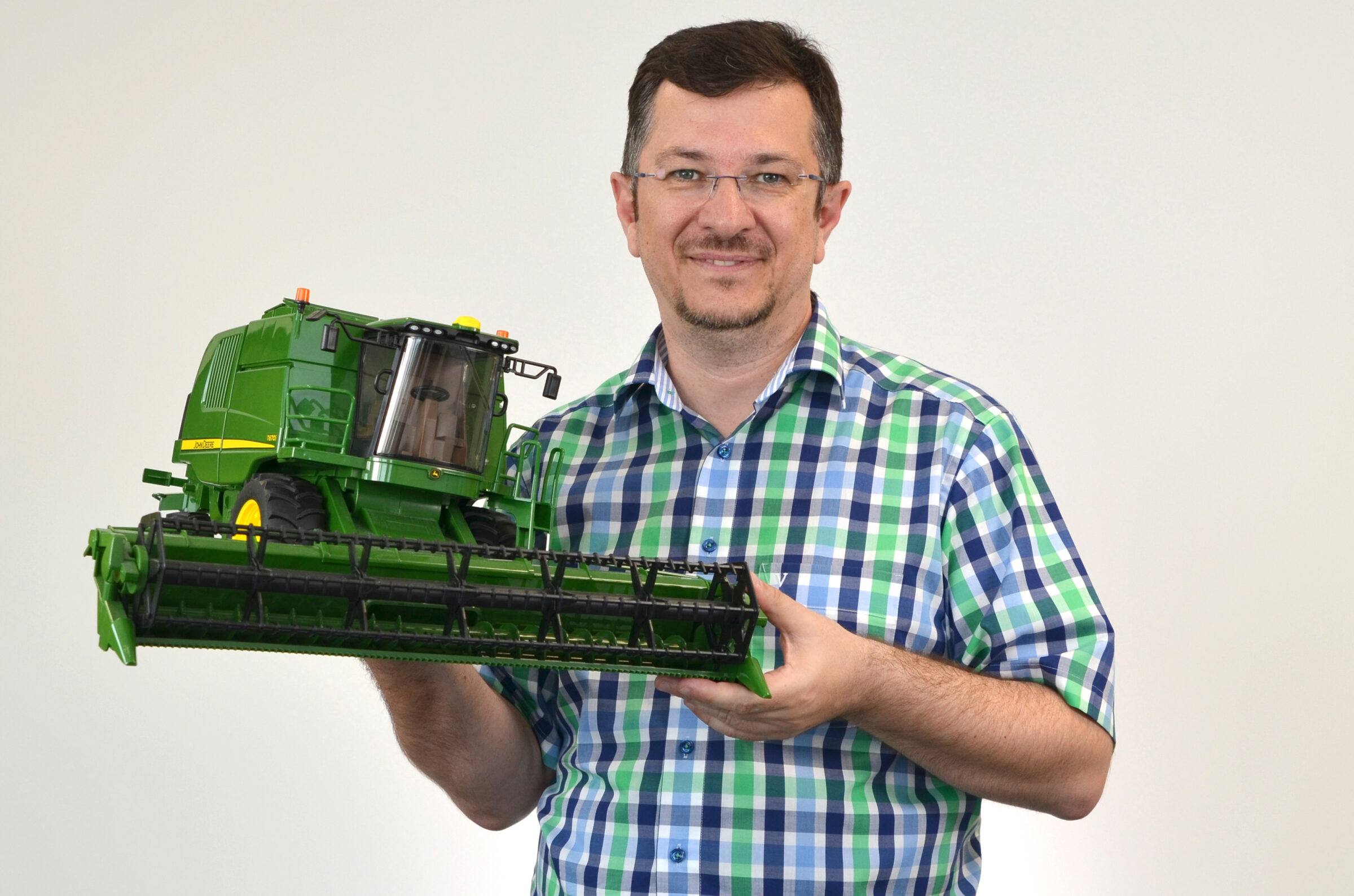 Markus mit John Deere Mähdrescher